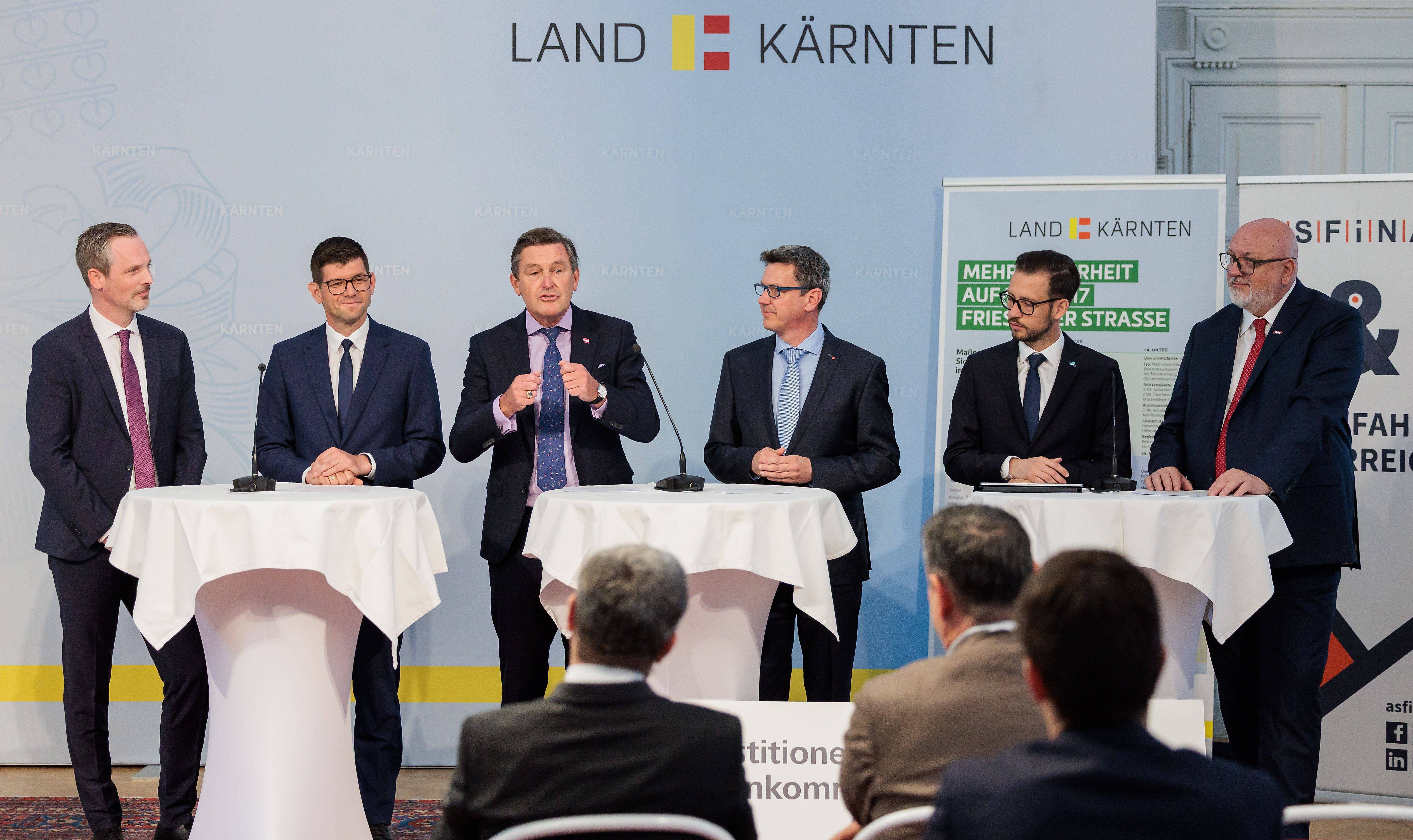 Sicherheitsausbau für B317 fixiert: Vorstand Hartwig Hufnagl (ASFINAG), LHStv Martin Gruber, BM Peter Hanke, LH Daniel Fellner, LR Sebastian Schuschnig und Vorstand Andreas Matthä (ÖBB)